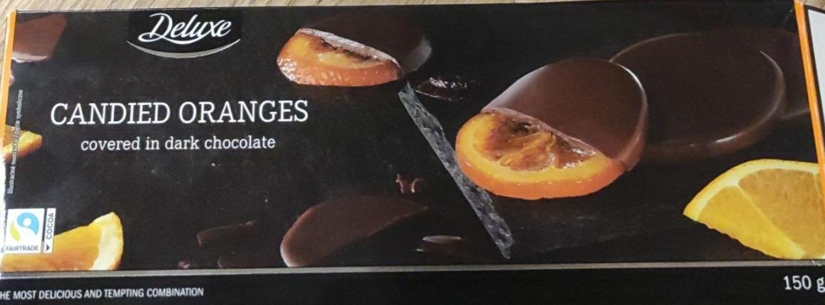 Fotografie - Candied oranges coated in dark chocolate