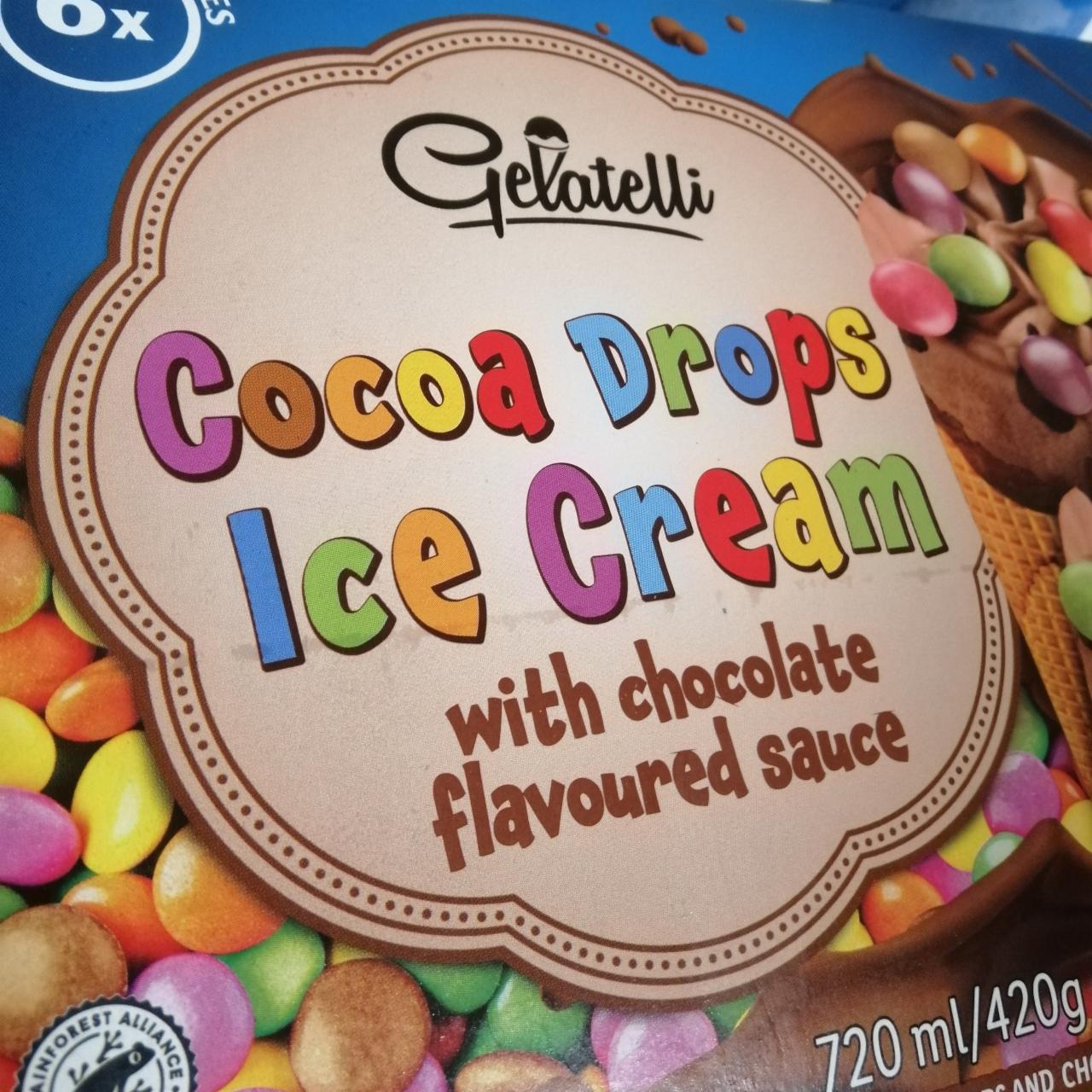 Fotografie - Cocoa drops ice cream with chocolate flavoured sauce Gelatelli