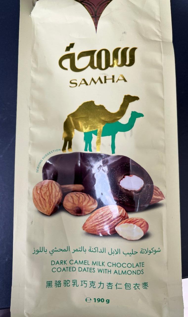 Fotografie - Dark caramel milk chocolate coated dates with almonds Samha