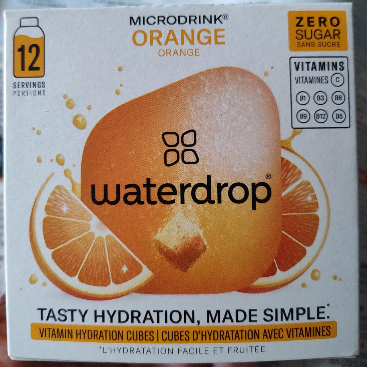 Fotografie - Orange microdrink waterdrop