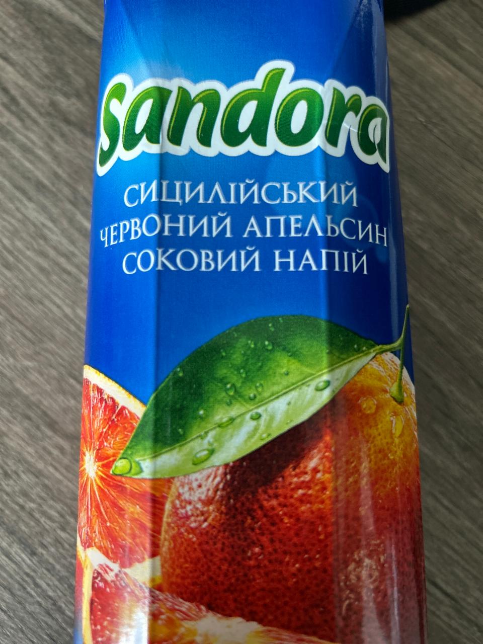 Fotografie - Cицилийский красный апельсин cоковый напиток Sandora